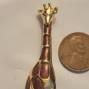 Vintage LIZ CLAIBORNE giraffe pin, signed Liz, is gold colored metal with brown